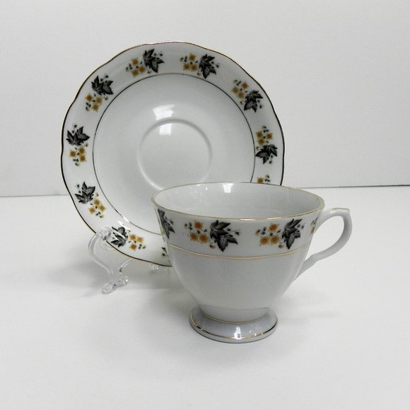 Collectable Vintage Yong Sheng Porcelain Cup & Saucer Black Leaf Yellow Flower - Picture 1 of 8